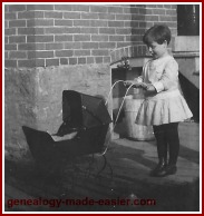 1911 My mom with her doll and pram