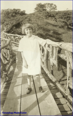 Young girl on the golf course bridge